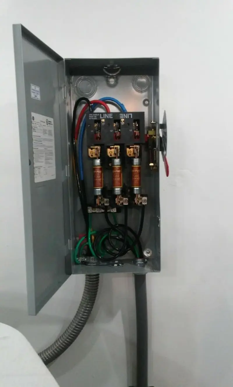 Three-phase disconnect switch installed for Smoke Detector Installation in Canaan
